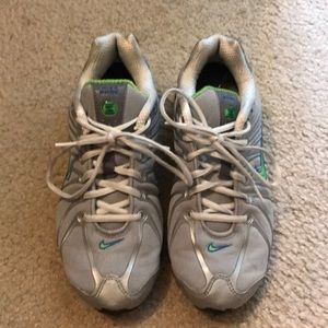 Blue, neon green, and silver Nike Shox